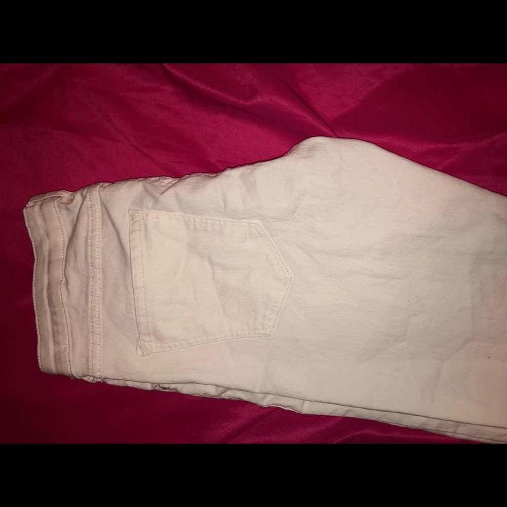 All white H&M super skinny jeans